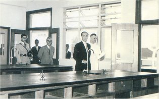 Governor Sir Robert Black and Br. Breden visiting the Senior Chemisty Laboratory